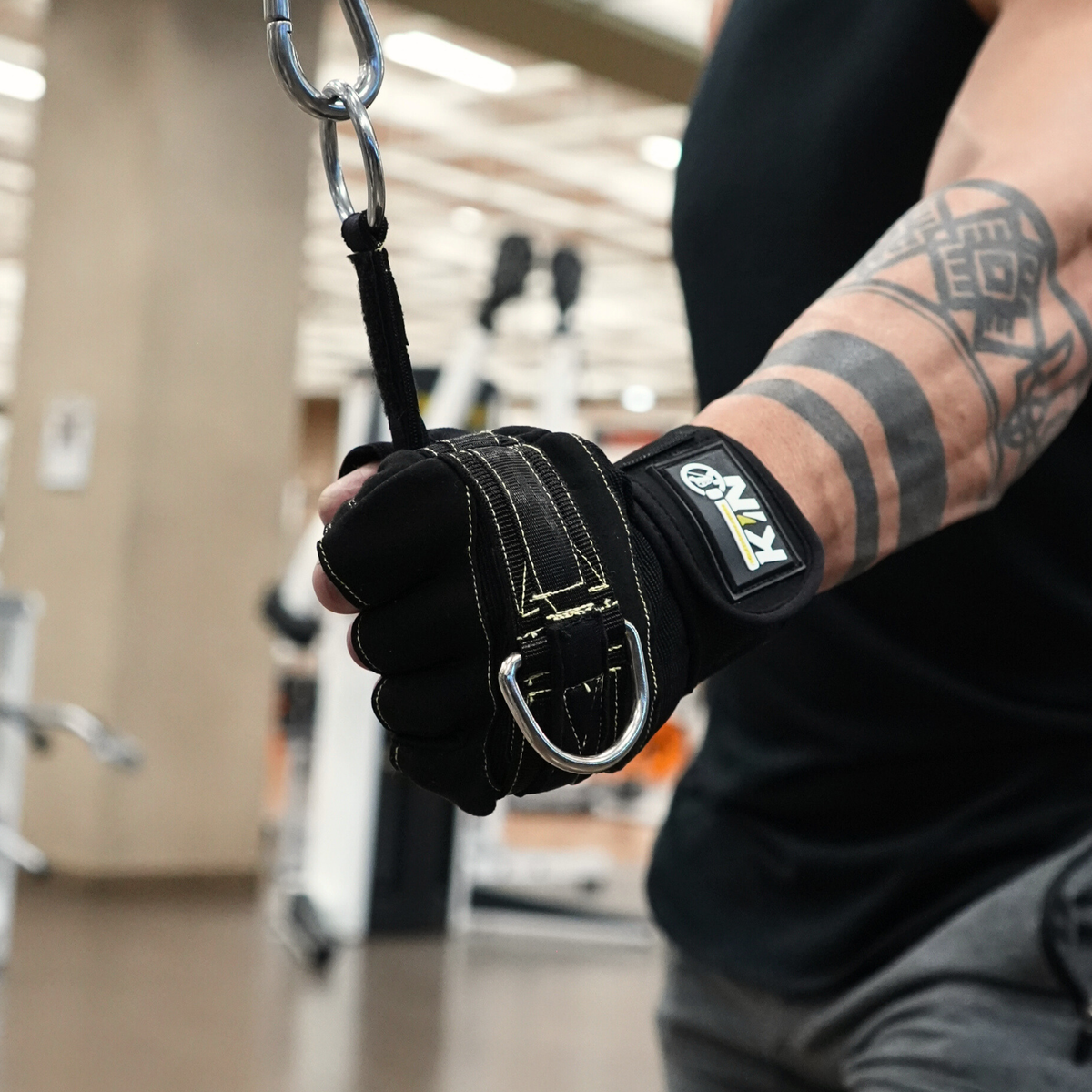 Size K3 KIN Isolation Harness connected directly to cable resistance using the O-ring attachment for a tricep pressdown